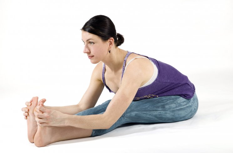 Seated forward fold. (freedoctorhelpline)