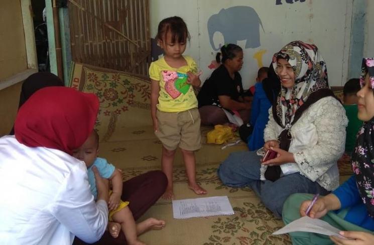 Pemeriksaan Stimulasi Deteksi dan Intervensi Dini Tumbuh Kembang (SDIDTK) di Posyandu Balita APOKAT 1 Dusun Bangmalang, Pendowoharjo, Sewon, Bantul pada Minggu (20/1/2019). (Istimewa)